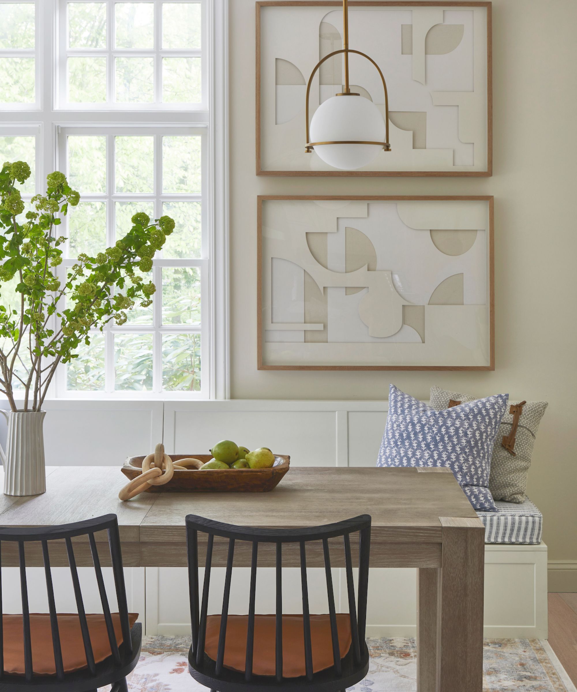 A modern dining room with walls painted in Simply White Benjamin Moore