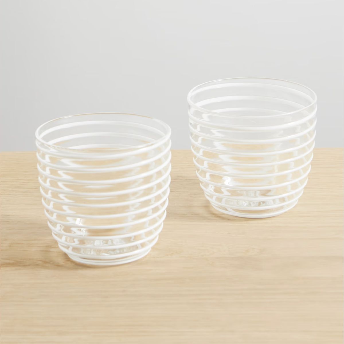 Two white drinking glasses