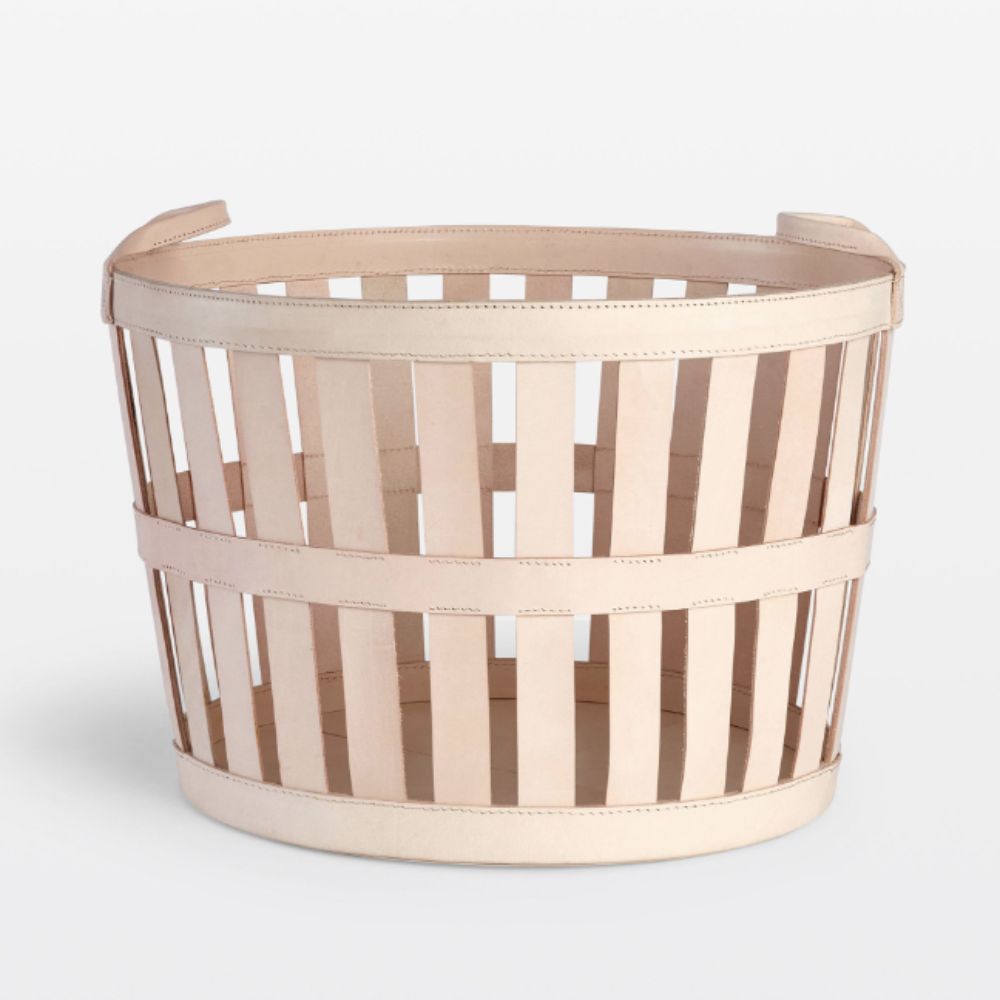 Neutral leather weave basket on white background