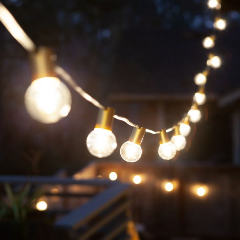 String lights lighting up a yard